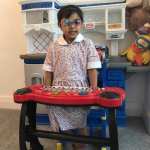 Jasmine playing her piano