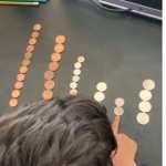 zidan counting money to assist him with an activity